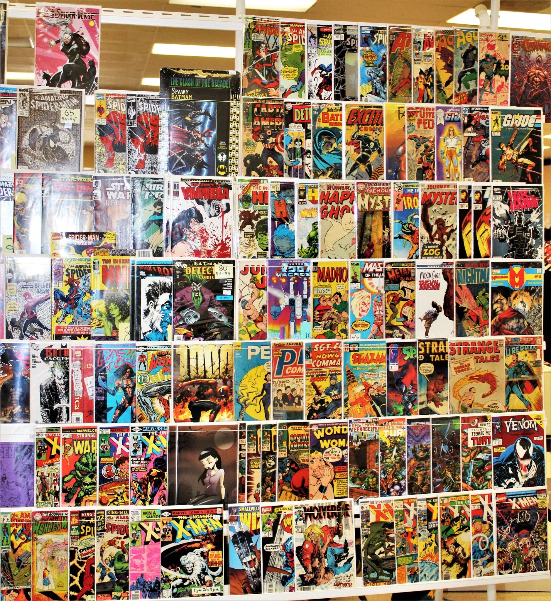 Wall display of vintage and modern comic books at the show