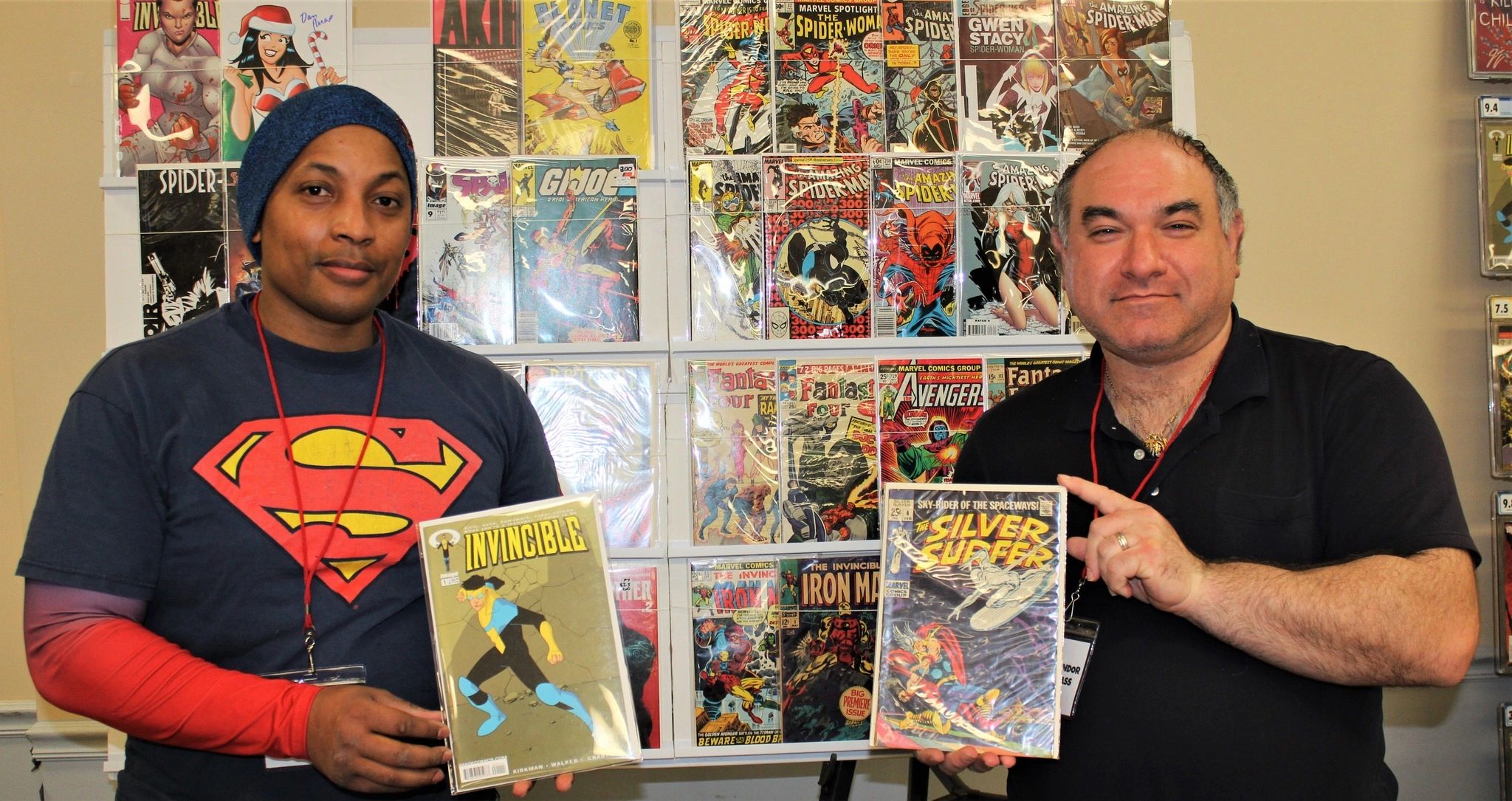 Collectors with vintage comic books